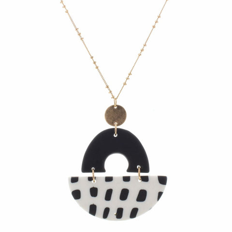 POLYMER BLACK ARCH WITH WHITE HALF CIRCLE WITH BLACK DOTS NECKLACE