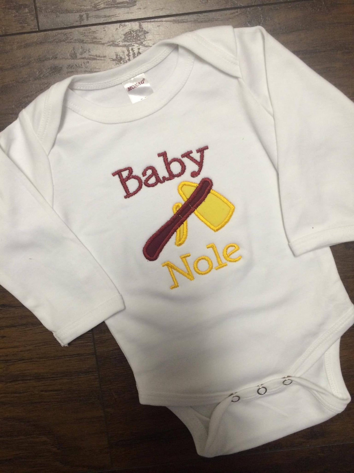 Baby Nole Onesie