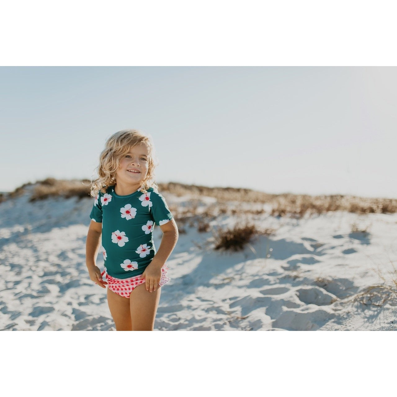 Oopsie Daisy Teal and Coral Ruffle Rash Guard