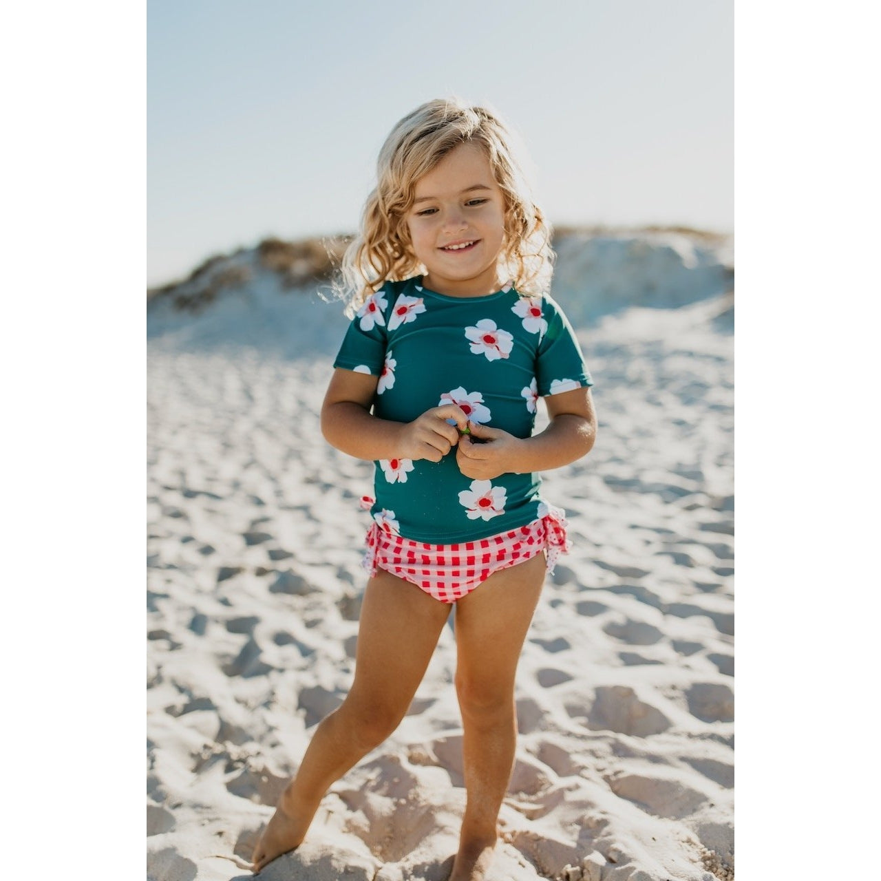 Oopsie Daisy Teal and Coral Ruffle Rash Guard