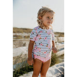 Oopsie Daisy Gray and Pink flower Ruffle Rash Guard