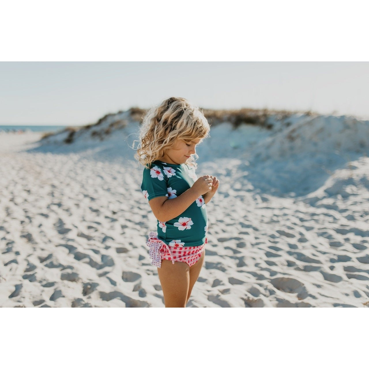 Oopsie Daisy Teal and Coral Ruffle Rash Guard